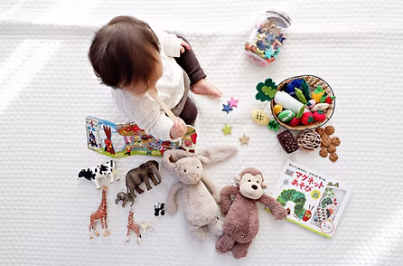 Toddler with toys